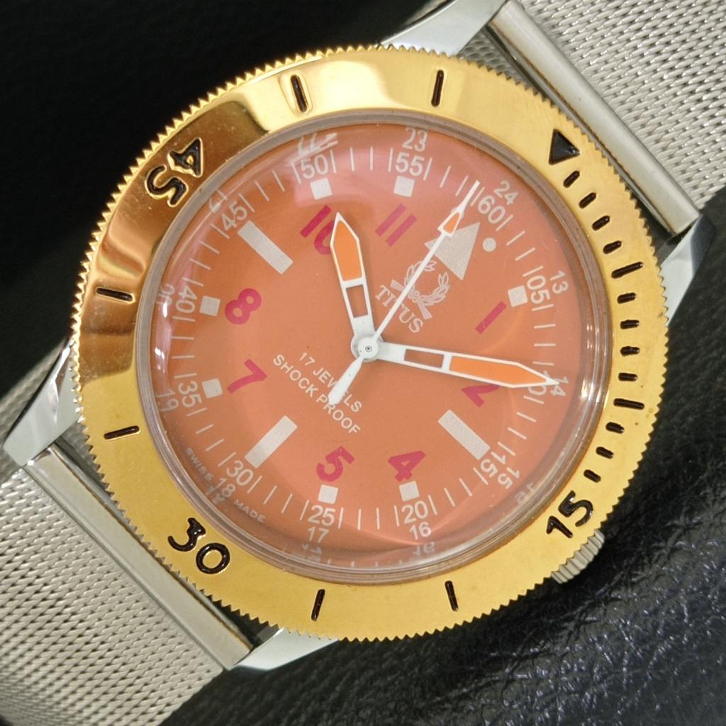 

ШВЕЙЦАРСКИЕ МУЖСКИЕ ВИНТАЖНЫЕ ЧАСЫ TITUS С РУЧНЫМ ЗАВОДОМ, ВРАЩАЮЩИМСЯ БЕЗЕЛЕМ, ОРАНЖЕВЫМ ЦИФЕРБЛАТОМ a700010-5 R201-a700010