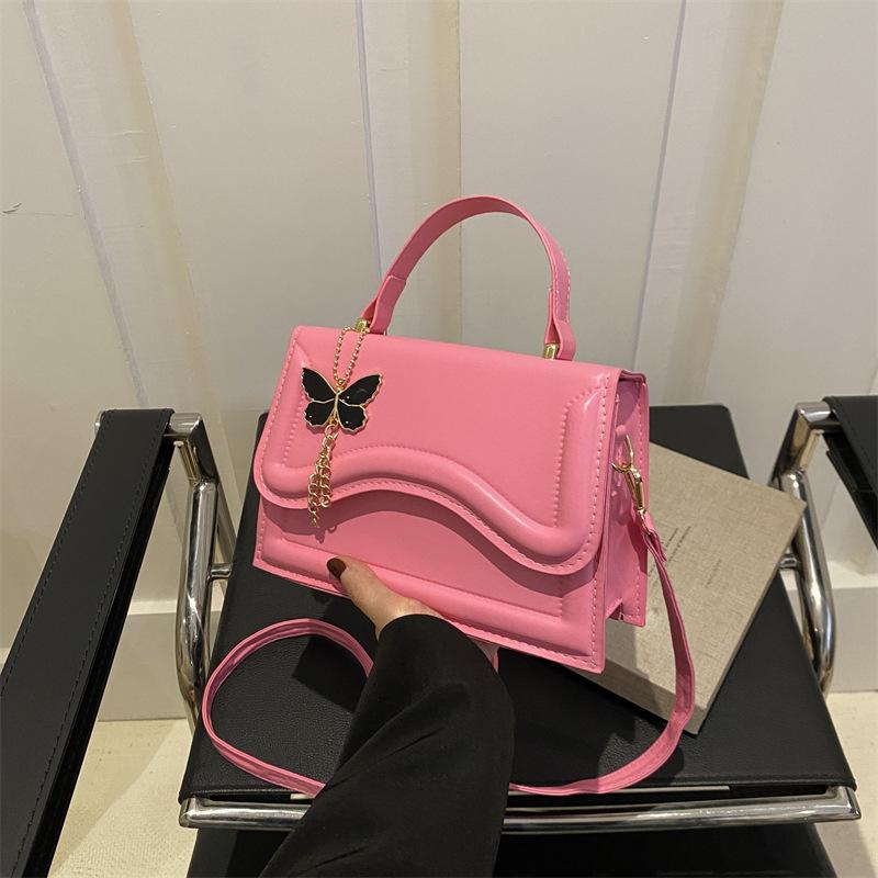 

Casual simple small square bag 2024 spring new personalized shoulder bag fashion commuter messenger bag popular handbag троянди рожеві кольору