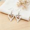 1 Pair of Retro Style Hollow Heart-shaped Pendant Earrings, Casual Decoration - The Perfect Gift for Her