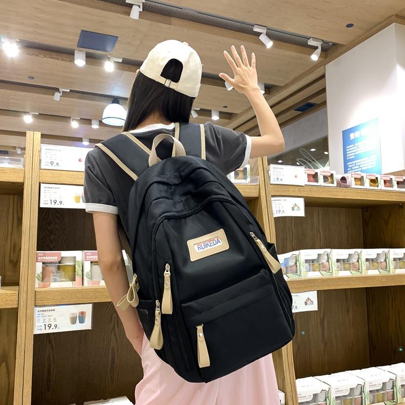 

New student schoolbag, same for men and women, spliced casual backpack, large-capacity campus backpack, fashionable чорний