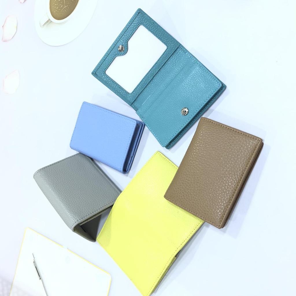 Premium Leather Card Holder: Unisex Cowhide Business Case with Mirror Window, Snap Closure & Coin Purse.