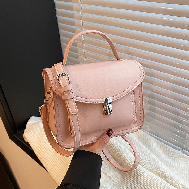

Premium texture small bag women s 2025 new spring and summer popular popular versatile messenger bag fashionable portable small square bag розовый