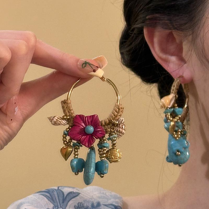 

Bohemian rattan flower elephant fringed earrings retro ethnic style earrings design sense earrings