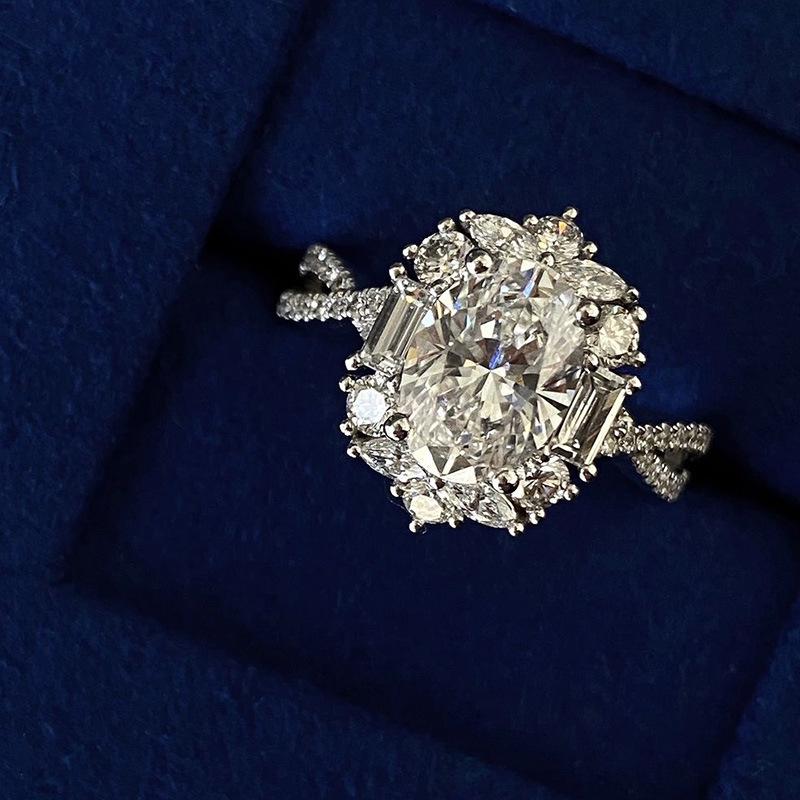 Elegant Simulated Moissanite Ring In White Gold with Pigeon Egg Diamond Design and Zirconia - Women's Luxury Jewelry.