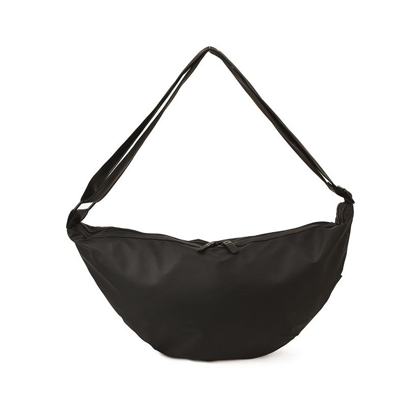 

Korean casual style large capacity girls black messenger bag student canvas shoulder bag commuter bag dumpling bag tide