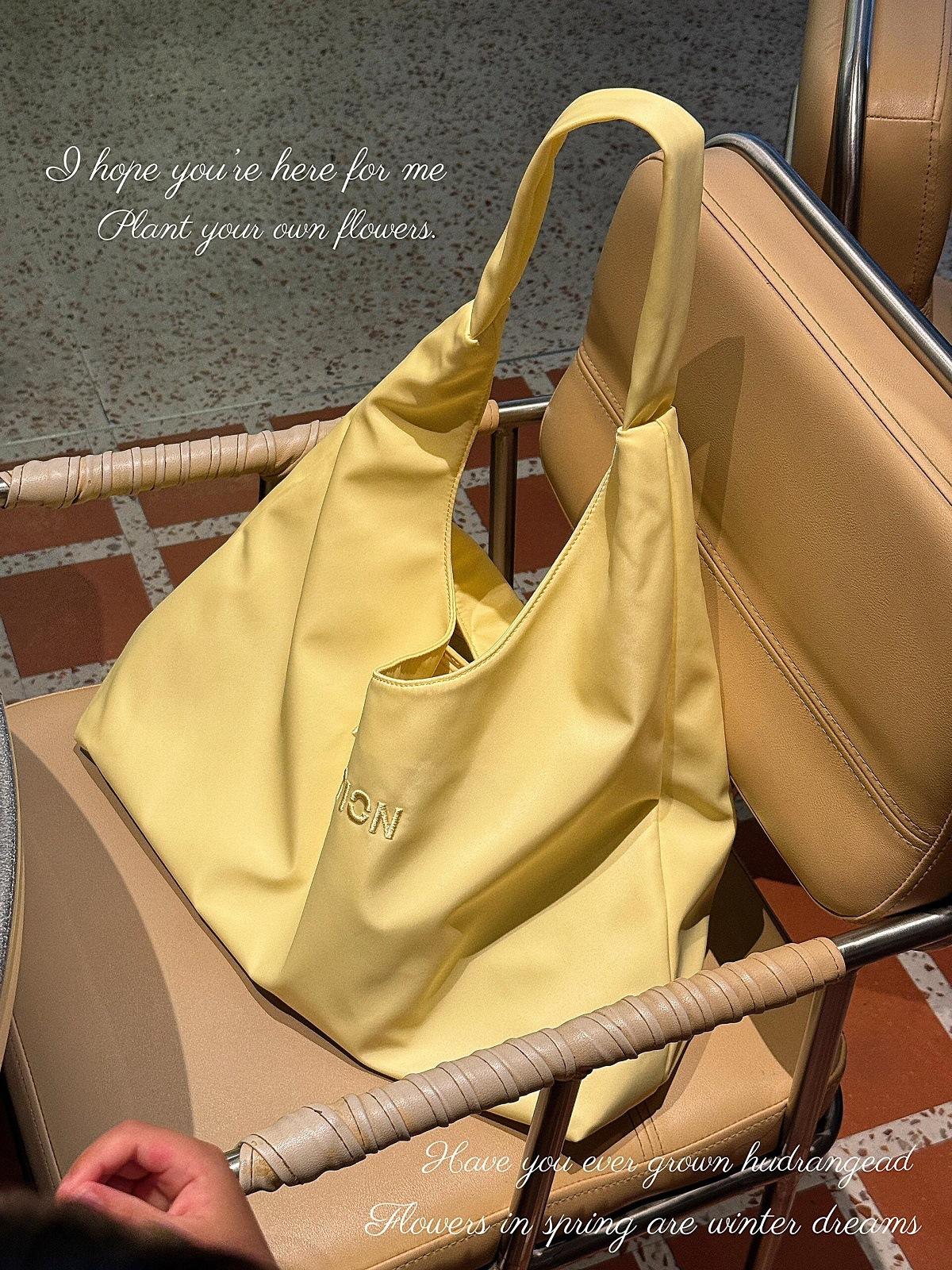 

Летняя новая сырно-желтая сумка-тоут большой вместимости, новая нишевая дизайнерская сумка через плечо, сумка для поездок на работу, сумка для мамы и ребенка жёлтый