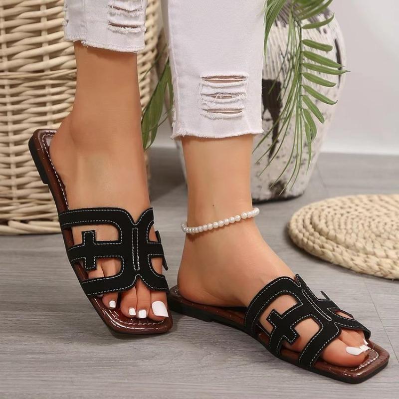 Fairy wind flat-bottomed cool slippers female new large size H leather one-word slippers summer wear beach sandals