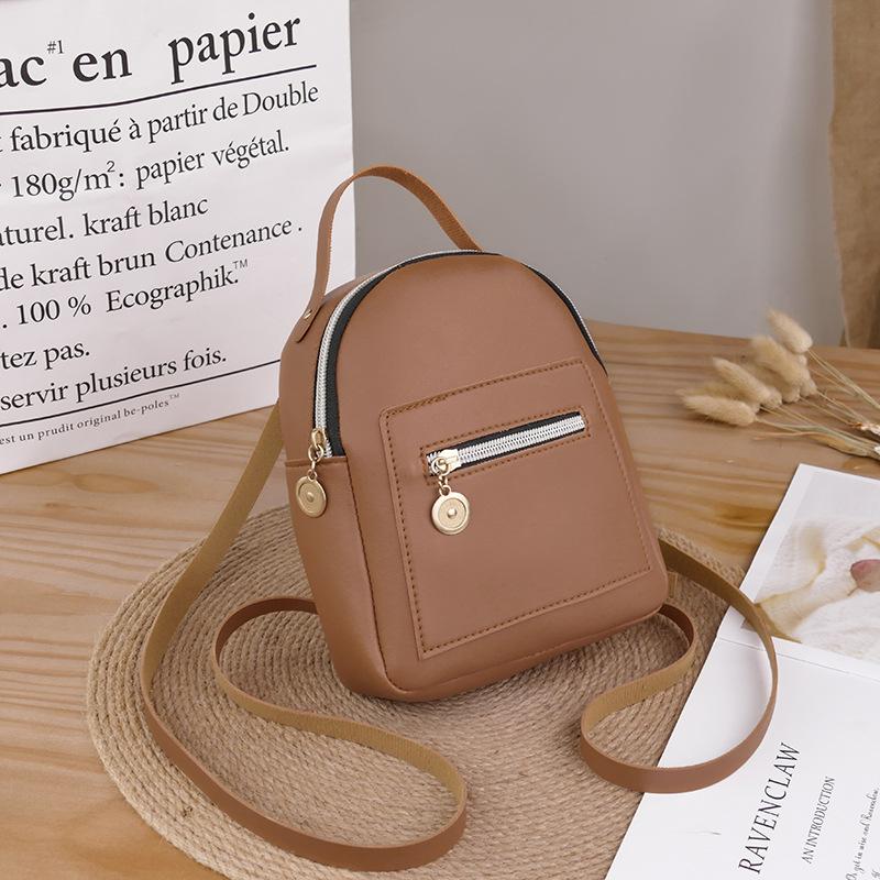 

2025 простий однотонний коледжний рюкзак багатофункціональна міні-шкільна сумка на одне плече жіноча сумка кросбоді портативна сумка для змін коричневий