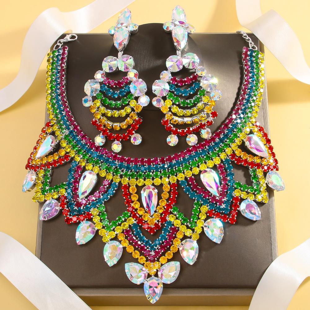 

Лидер продаж Набор украшений «Капля воды» Преувеличенный цвет Стразы Цепочка на ключицу Серьги с бахромой Женский набор украшений earings