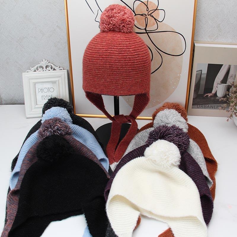 Cute hairball lace-up ear hat retro knitted wool hat autumn and winter outdoor cold-proof face little Lei Feng hat