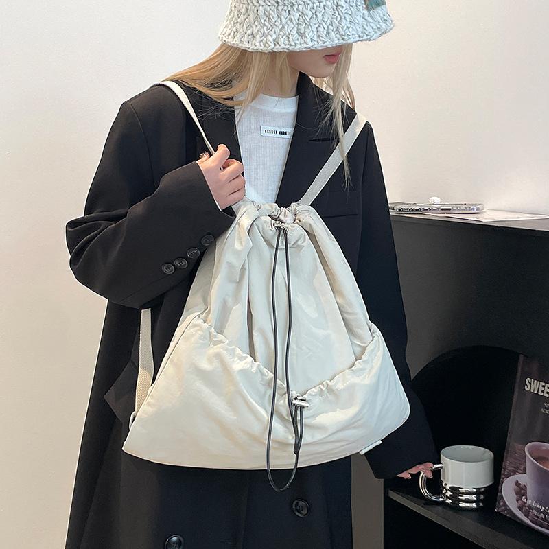 Niche daily leisure lightweight sports drawstring backpack commuter student schoolbag