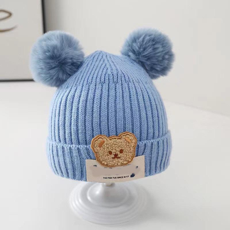 Baby autumn and winter cute cartoon warm hairball wool hat boys and girls baby ear protection hat children pullover knitted hat