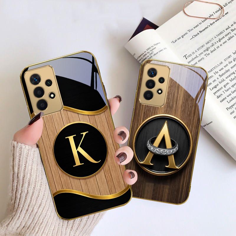 Luxurious emblem letters For Samsung A 01 52S A04 A05S A10 A12 13 22 23 24 36 42 M02 Note 10 20Ultra 8 9 Golden glass phone case