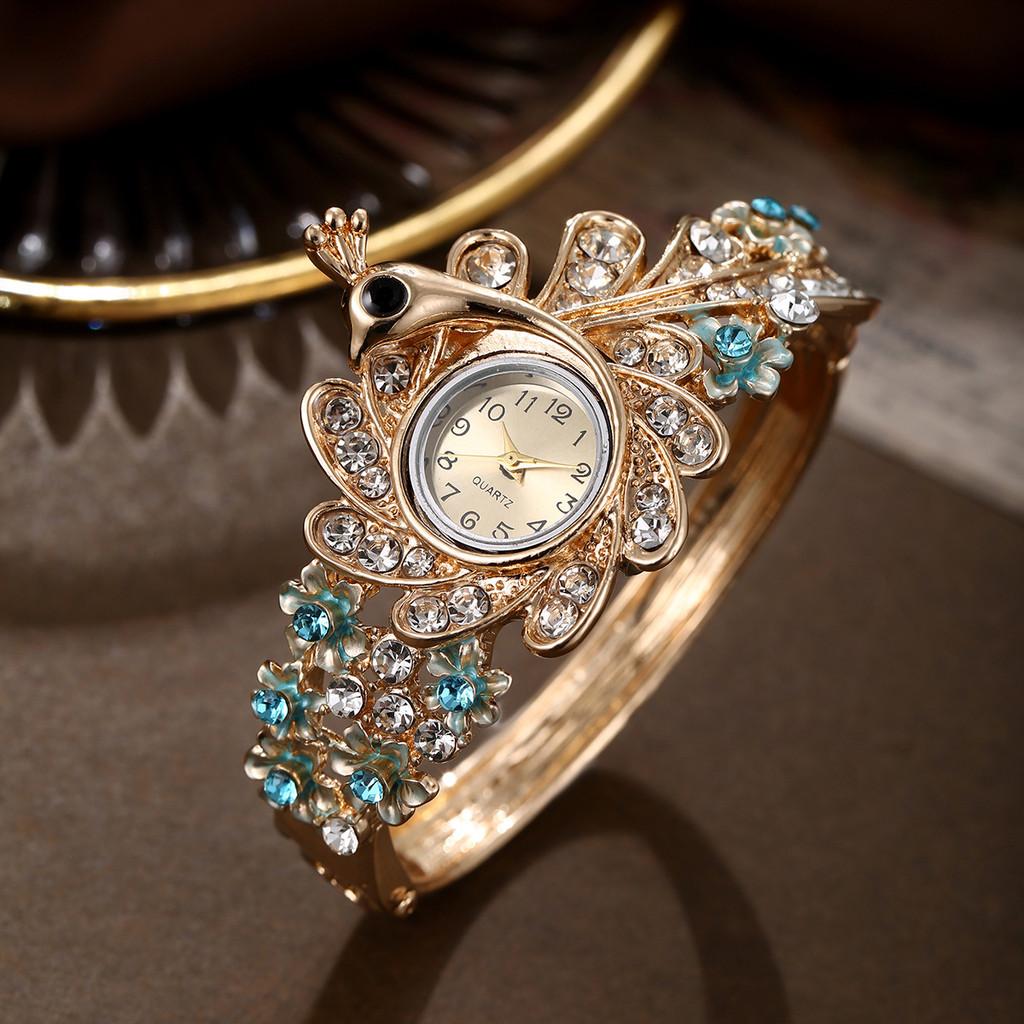 Ladies Peacock Stone Quartz Watch With Hollow Flower Alloy Bracelet For Fashion Accessory