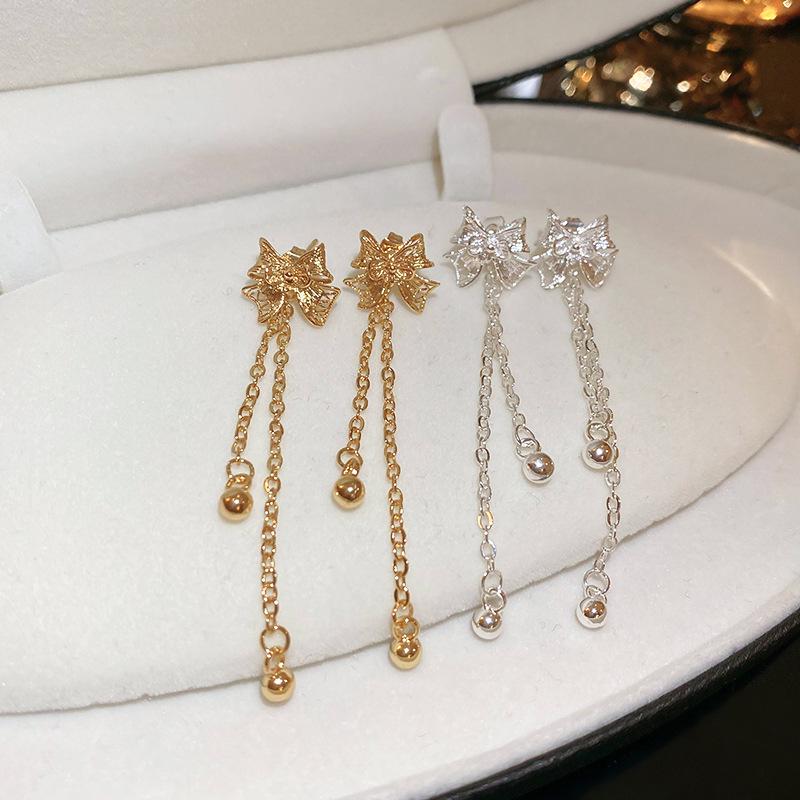 

Metallic Bow Chain Tassel Silver Earrings - Trendy Niche Design for Women