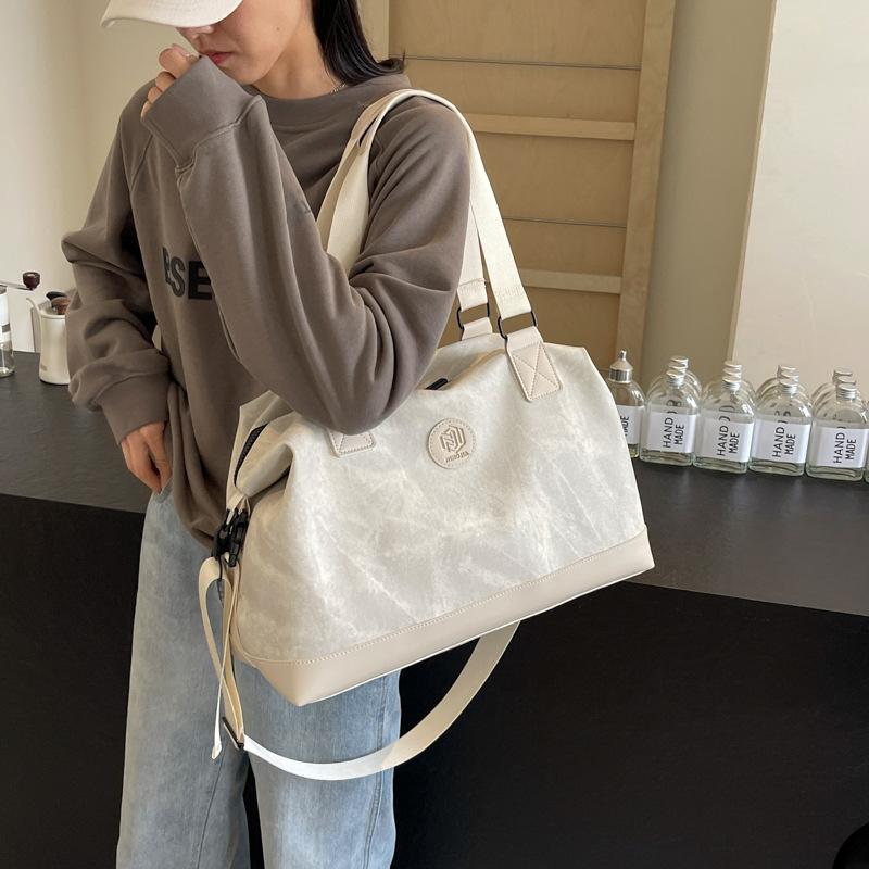 Travel bag Large capacity high-end messenger bag Fitness business trip casual fashion simple shoulder tote bag Duffel bag