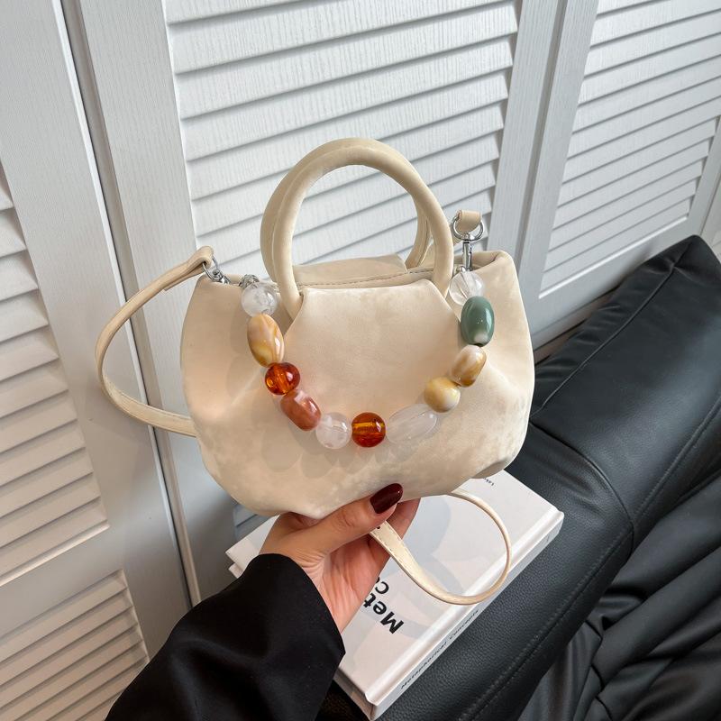 

Niche bag women s new summer versatile messenger bag casual pleated portable bucket bag белый