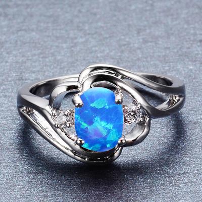 Bague Polyvalente pour Femme Européenne et Américaine Ovale Creuse Incrustée de Micro Diamants Bleus et Blancs