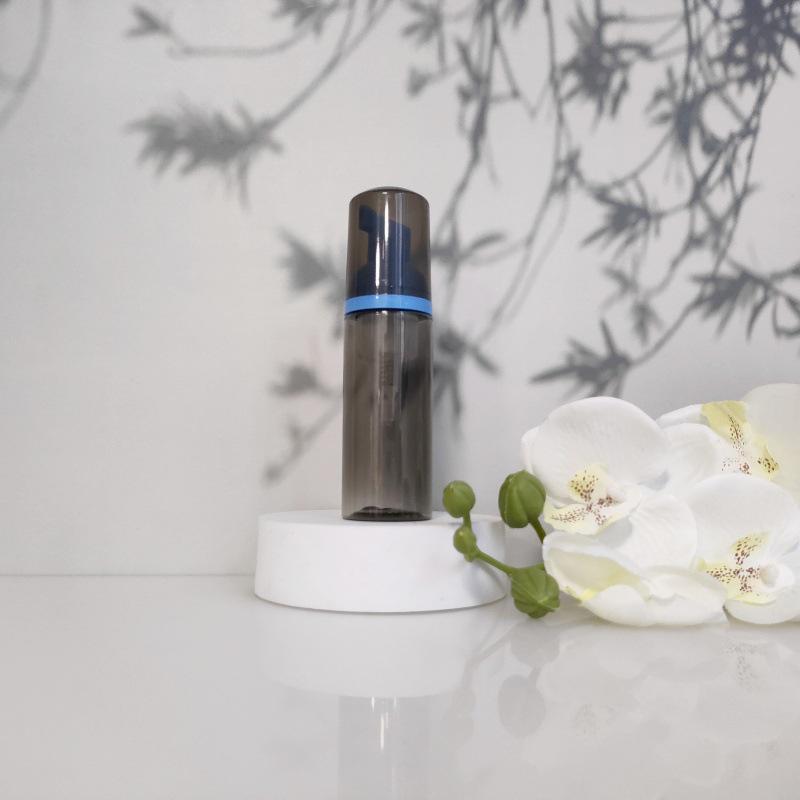 Available 60ml Transparent Black Foam Mousse Bottle for Face Wash and Travel-friendly Cosmetic Packaging.