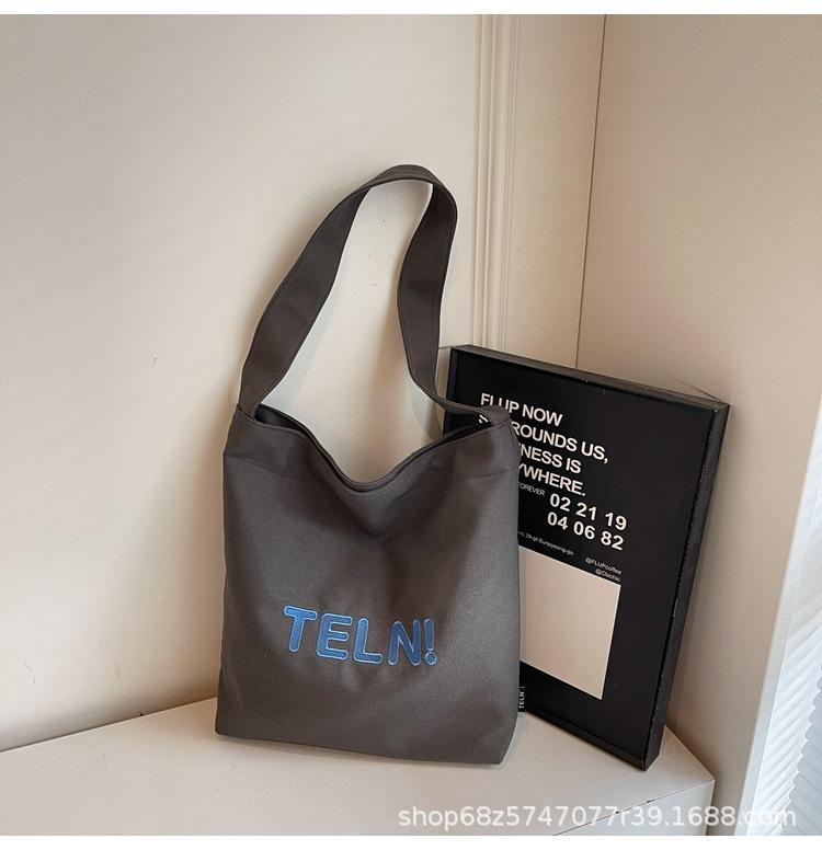 Shoulder bag, women's printed canvas bag, street large-capacity student bag, casual literary trendy brand canvas bag