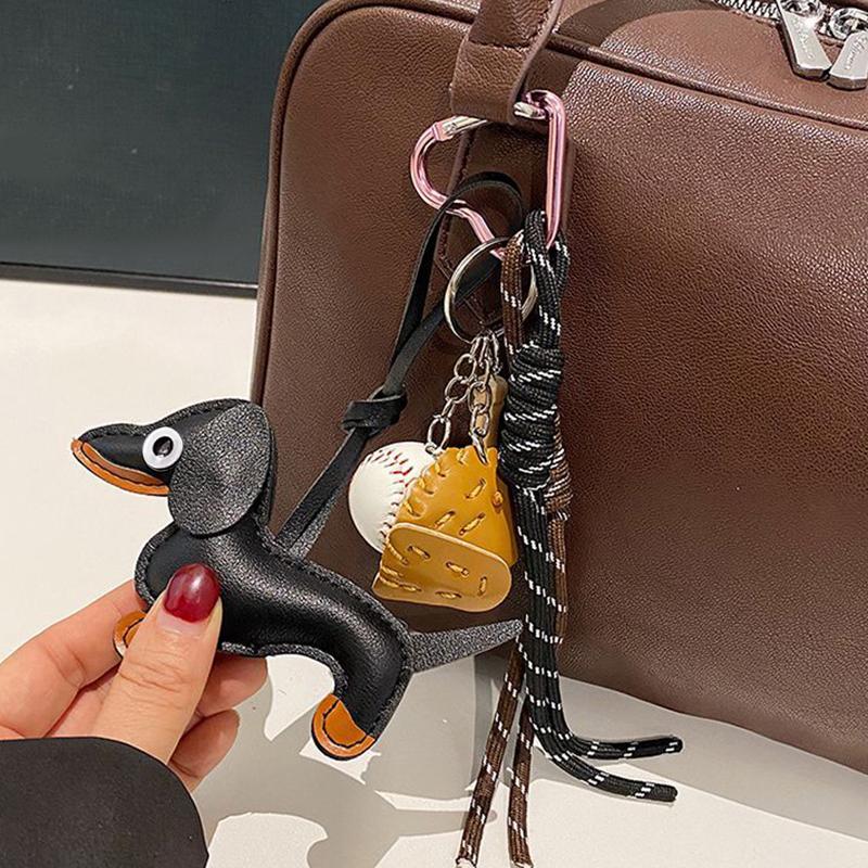 

Yogodlns Подвеска для сумки из ПУ кожи Такса, Сумка-кошелек с собакой-сосиской, Аксессуары для сумок, Запасные части для сумок one size чёрный