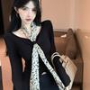 Elegant Leopard Print Waist-Cinching Long-Sleeve Pleated Top with Ribbon Detail