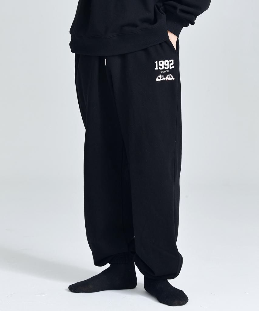 Daenkkomma Crayon Shin-Chan 1992 Face Embroidery Sweatpants (Black, Cream)