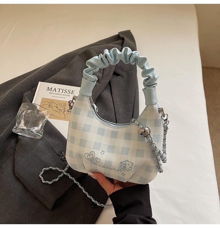 

Корейская версия клетчатой портативной сумки-пельменя женская 2025 новая универсальная темпераментная нишевая с высоким чувством повседневная сумка-мессенджер для поездок на работу