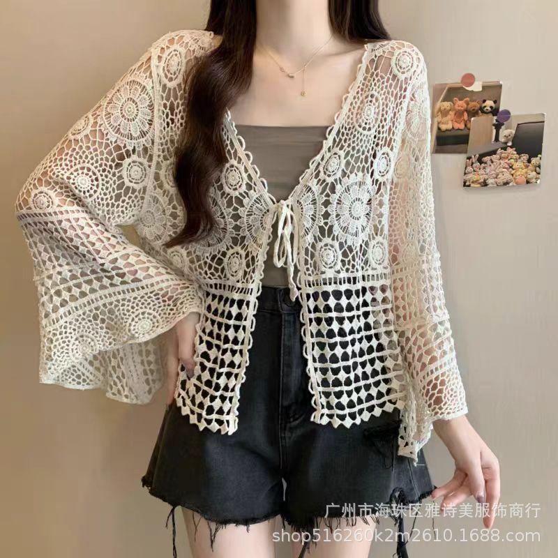 Fashion loose and thin hollow crochet knitted sweater women's new foreign style unique chic cardigan long-sleeved top