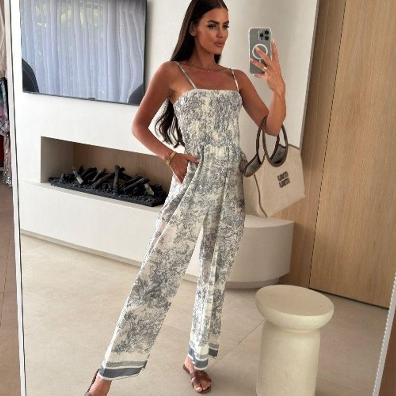 European and American New Print off-the-Shoulder Collar Waist Hugging Pocket Fashion Grab Sling Jumpsuit Cropped Pants Jumpsuits