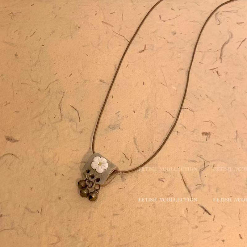 Retro pendant, ethnic style ceramic butterfly bell necklace, women's new trendy long sweater chain with accessories