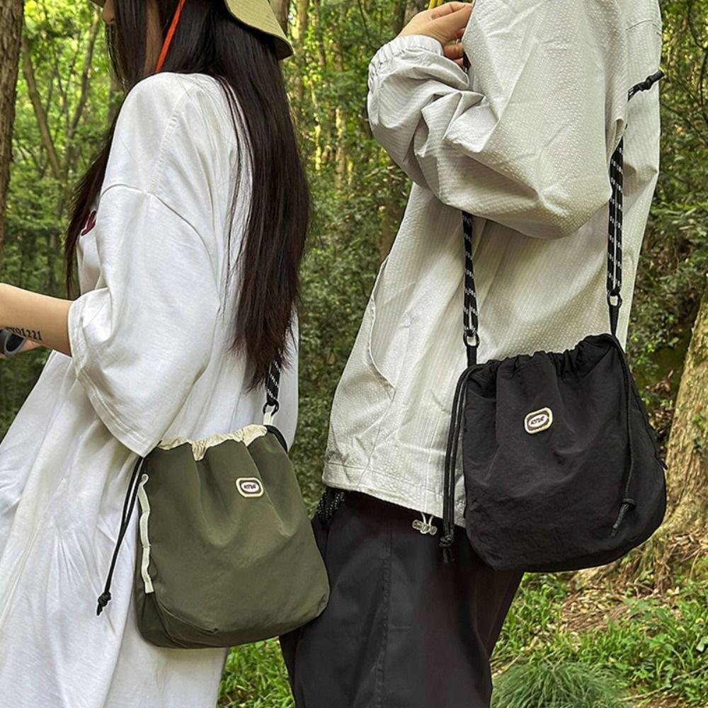 

Sports Drawstring Crossbody Bag Solid Color Mobile Phone Pack Waterproof Nylon Shoulder Bag Unisex хакі