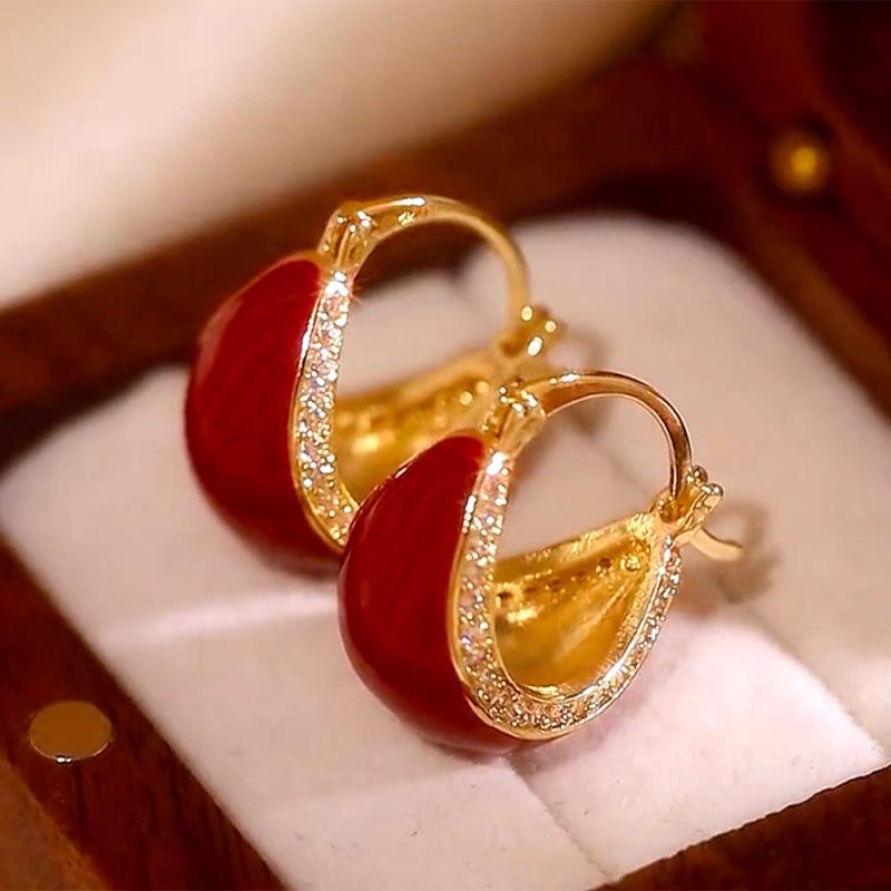 Zirkon Perlmutt Sunburst Ohrklemmen: Elegante, vielseitige Ohrringe für Frauen.