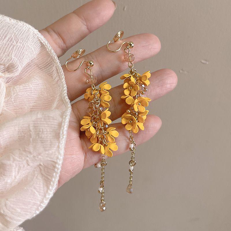 

Summer Long Fringe Seaside Southeast Asia Mosquito Coil Ear Clip A pair of turmeric mosquito coil ear clip