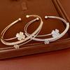Qionghua Elegant Zircon Clover Cat's Eye Openable Bracelet for Women