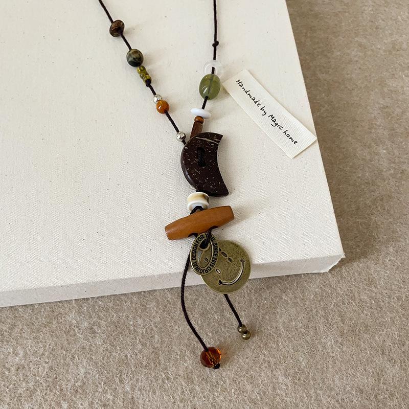 Retro Ethnic Style Crescent Moon Smiley Face Black Rope Long Necklace Women'S Light Luxury Temperament Elegant Versatile Neck Chain Sweater Chain