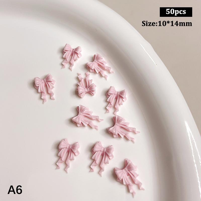 50 vnt. Ilgi banguoti lankeliai Nagų dailės priedai 2 dydžiai Spalvingi kaspino lankeliai 3D dervos nagų pakabukai Japoniškas nagų dekoras Mielos detalės Kaspinas