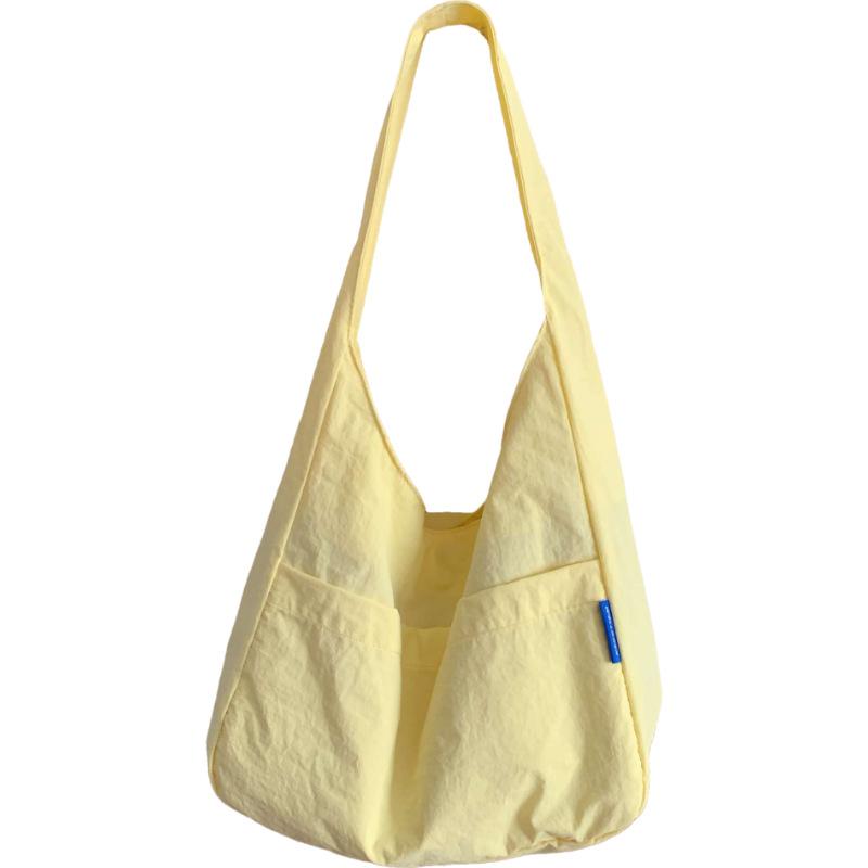Japon et Corée du Sud sac fourre-tout couleur unie style décontracté pour femme sac à bandoulière polyvalent décontracté pour les trajets quotidiens grande capacité sac pour étudiants cours soutien scolaire