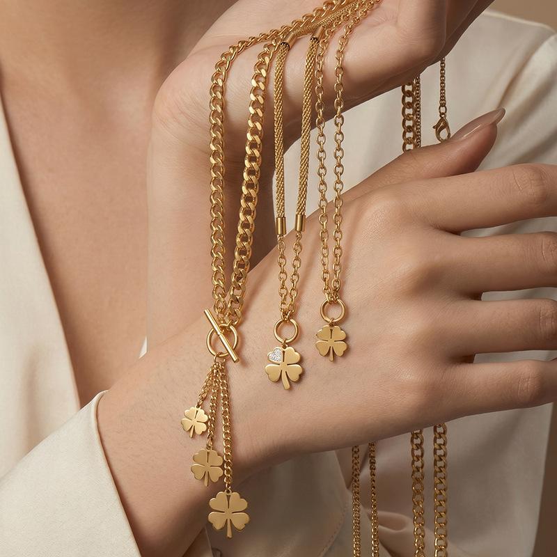 Golden four-leaf clover necklace women's light luxury retro double-layer chain pendant collarbone chain European and American style stainless steel