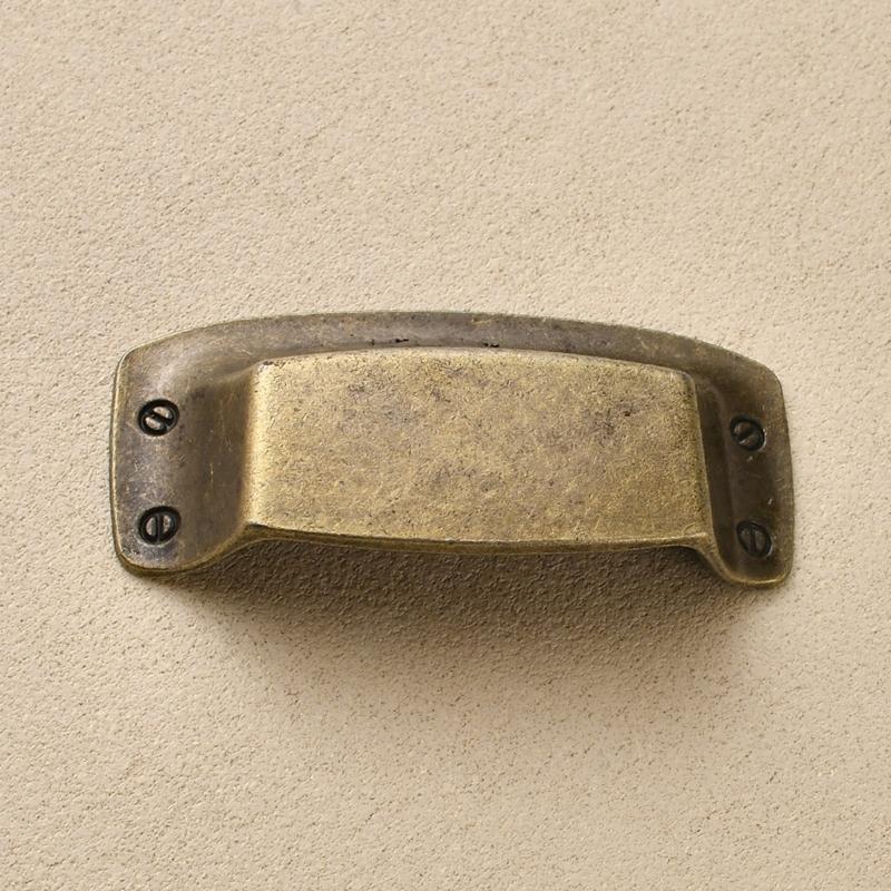 Ergonomic Curvilinear Form Handles for Drawer Entrances Offering Traditional Look and Strong Construction for Residential Application