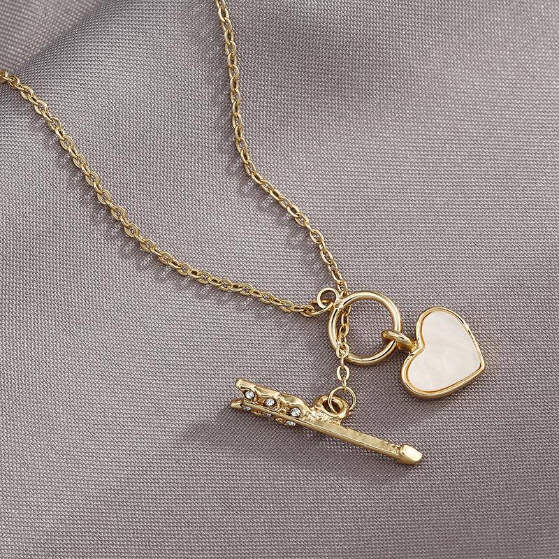 

One Arrow Through the Heart Necklace: Korean Shell Clavicle Chain for Women