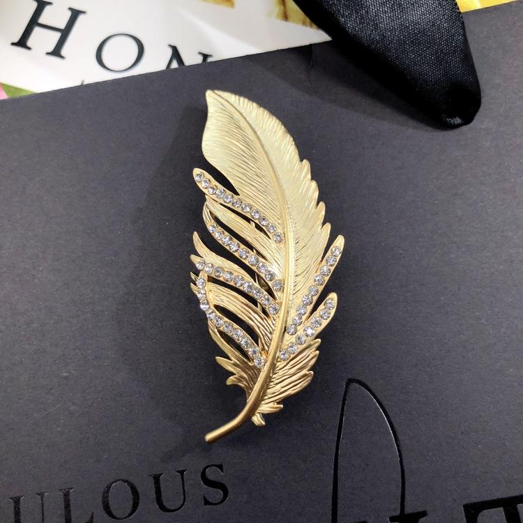 Fashion temperament dumb gold brooch corsage women's suit jacket sweater coat pin crystal high-end accessories