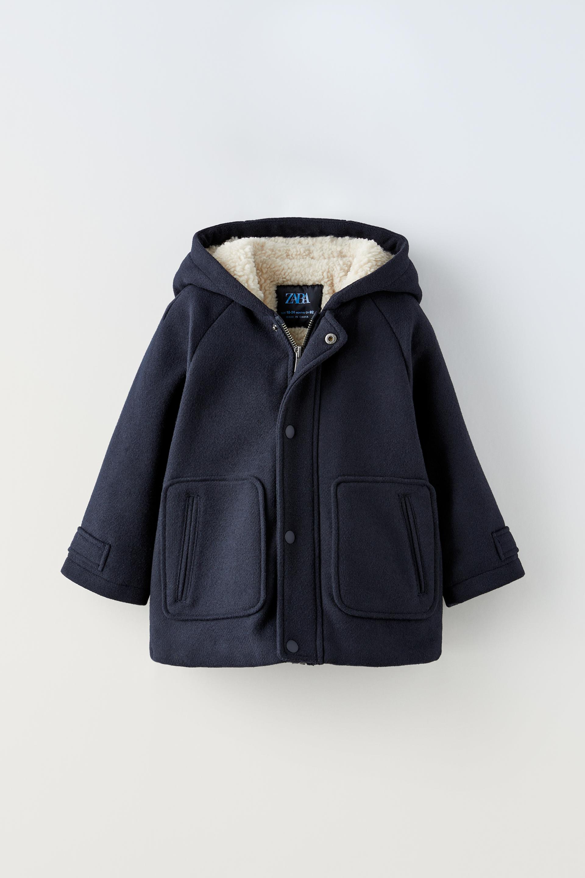 

ПАЛЬТО ИЗ ИСКУССТВЕННОЙ ДУБКИ С КАПЮШОНОМ