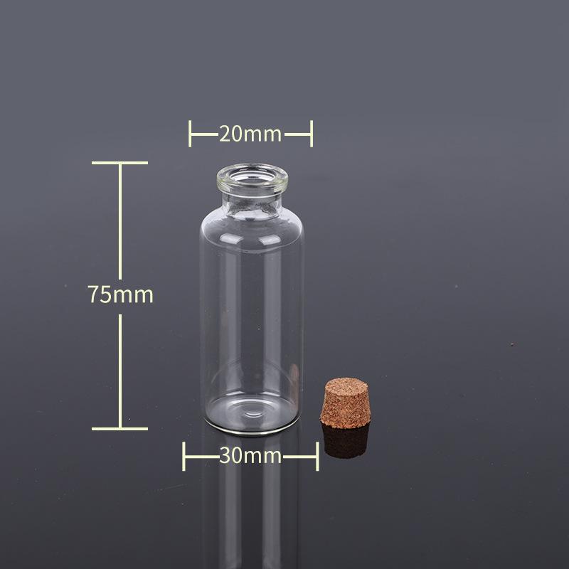 Kleine durchsichtige Glasflasche mit Korken