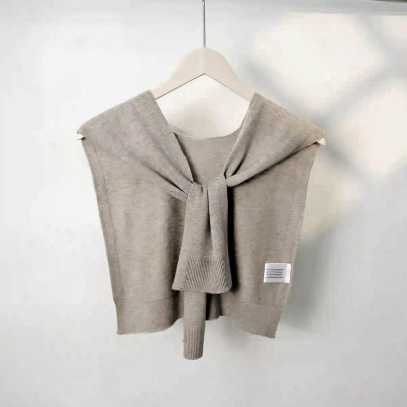 Solid color knitted small shawl fashionable versatile hollow high-end atmosphere white temperament outer small shawl