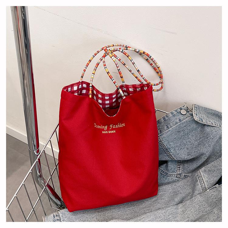 

Plaid double-sided shoulder armpit bag fashion trend large capacity portable canvas women s bag retro tote bag красный