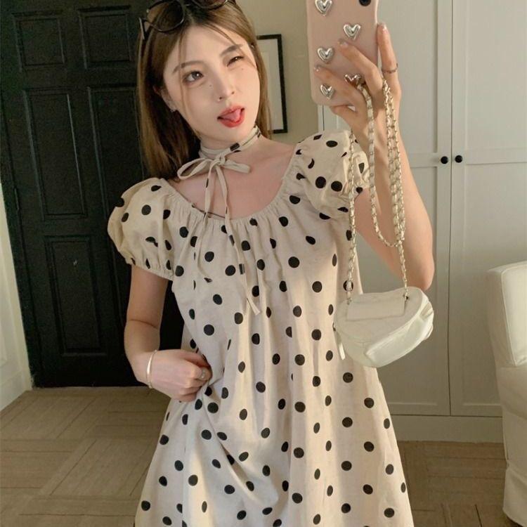 Sweet age-reducing contrasting color polka dot bubble sleeve dress women's summer new lace-up thin sweet medium and long dress