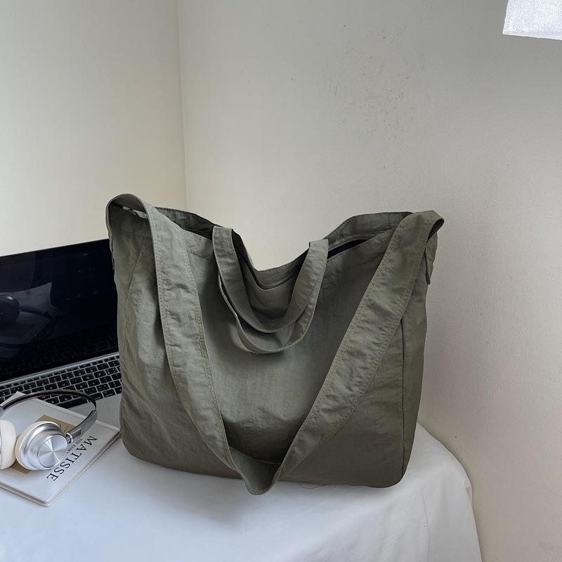 Large Capacity Commuter Tote Bag 2025 Autumn New Casual Fashion Simple Only Beautiful Woman College Student Bag