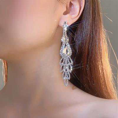 Avrupa ve Amerikan moda lüks parlak elmas uzun küpeler kadın mizaç zirkonyum küpe kulak takısı