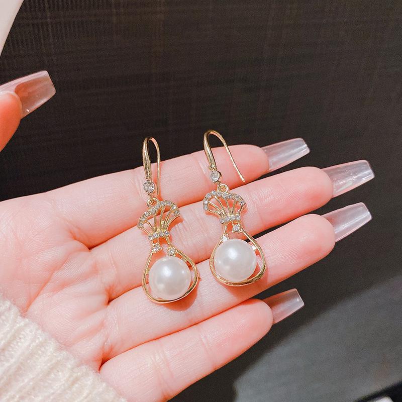 Cercei eleganți cu ciucuri pentru femei, 2024: Accesorii elegante, versatile pentru toamnă și iarnă